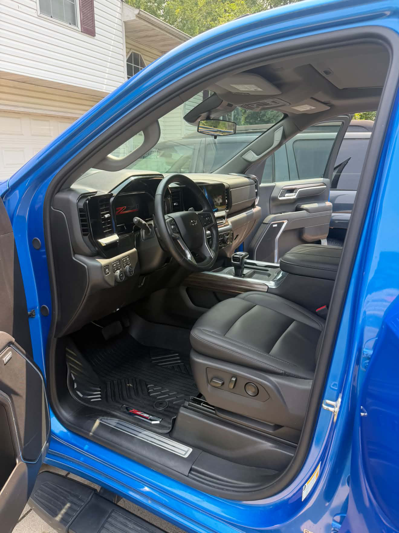 Clean blue Chevrolet truck interior after detailing